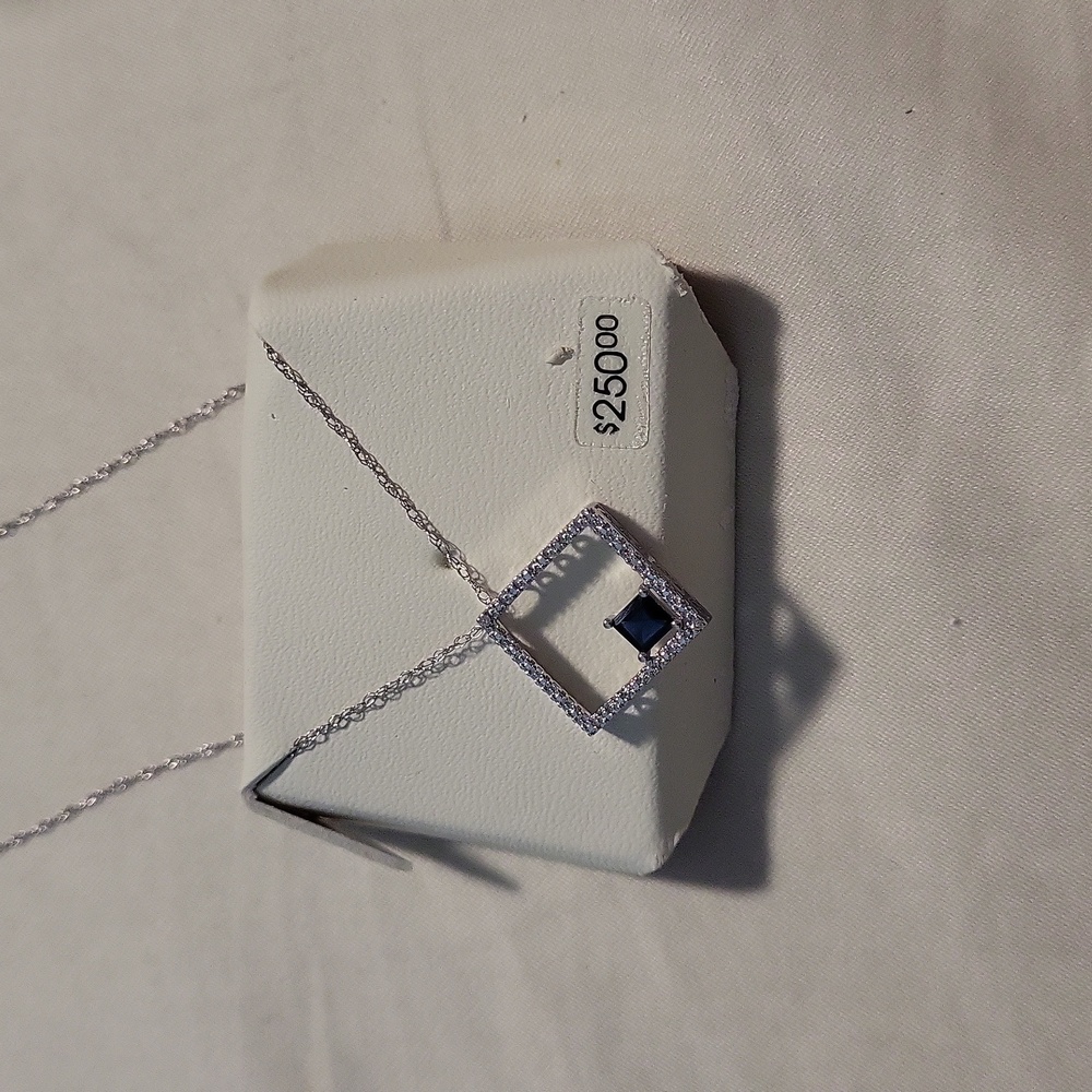 Blue sapphire stone with .1 diamond trim 16" necklace